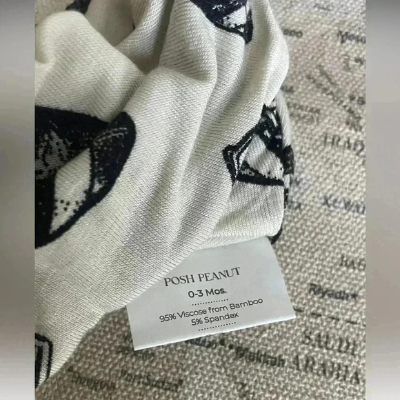 Posh Peanut 0-3mo Beanie Hat
Touchdown Print - Picture 3 of 3